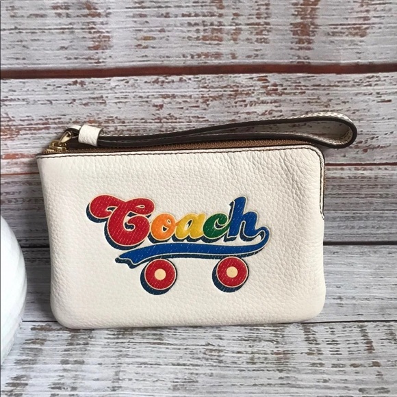 Coach Handbags - Coach Wristlet With Rainbow Roller Skate Graphic